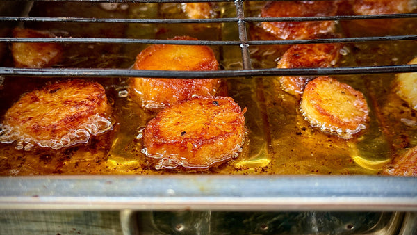 Crunchy potatoes cooked in the gas barbecue 