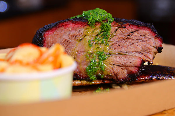 Smoked beef ribs with chimichurri sauce